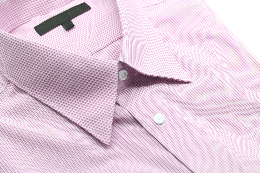 Why men-shirts have buttons on the other side than women-shirts